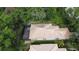 Aerial view showcases a residence with a private backyard, spa, and enclosed patio, enhancing outdoor enjoyment at 6744 Hickory Hammock Cir, Bradenton, FL 34202