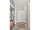 Inviting foyer featuring decorative tiled flooring, and abundant natural light at 6744 Hickory Hammock Cir, Bradenton, FL 34202