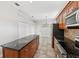 Spacious kitchen featuring a center island, and stainless steel appliances at 6744 Hickory Hammock Cir, Bradenton, FL 34202