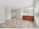 Inviting living room with tile floors and access to the foyer and kitchen at 6744 Hickory Hammock Cir, Bradenton, FL 34202