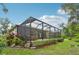 Enjoy the privacy and tranquility of this backyard oasis complete with a screened-in lanai and a spa at 6744 Hickory Hammock Cir, Bradenton, FL 34202