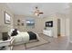 Cozy bedroom featuring a modern design, decorative rug and neutral tones at 7140 Marsh View Ter, Bradenton, FL 34212