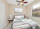 Cozy bedroom featuring a window and decorative artwork at 7140 Marsh View Ter, Bradenton, FL 34212