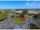 Beautiful entrance with landscaping and water view in a private community at 7140 Marsh View Ter, Bradenton, FL 34212