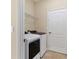 Convenient laundry room featuring modern washer and dryer units at 7140 Marsh View Ter, Bradenton, FL 34212