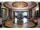 Elegant community lobby with seating, chandelier, and architectural detail at 7140 Marsh View Ter, Bradenton, FL 34212