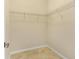 Practical walk-in closet with ample wire shelving for organized storage at 7140 Marsh View Ter, Bradenton, FL 34212