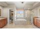Bright bathroom with shower, soaking tub, and double vanity at 743 Stonecrest Dr, Sarasota, FL 34232