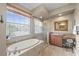 Bright bathroom with large shower, soaking tub, vanity and mirror at 743 Stonecrest Dr, Sarasota, FL 34232
