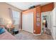 Bedroom featuring closet space, natural light, and colorful decor at 743 Stonecrest Dr, Sarasota, FL 34232