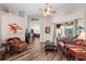 Comfortable living room with wood floors and ample seating at 743 Stonecrest Dr, Sarasota, FL 34232
