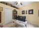Office space with neutral carpet, shelving and closet at 743 Stonecrest Dr, Sarasota, FL 34232