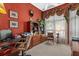 Well-appointed office features a traditional desk, bookcase, and large window with decorative valance at 7513 Coventry Ct, Lakewood Ranch, FL 34202