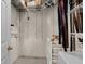 Walk-in closet with metal shelving and hanging storage, perfect for organization at 7513 Coventry Ct, Lakewood Ranch, FL 34202
