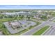 Aerial view of a commercial area with a Burger King, Walmart, and ample parking at 8382 Creekview Ln, Englewood, FL 34224