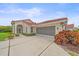 Beautiful home exterior with a well-maintained lawn and driveway at 8382 Creekview Ln, Englewood, FL 34224