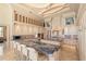 A chef's dream kitchen with high-end appliances and custom cabinetry at 845 Longboat Club Rd, Longboat Key, FL 34228