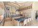 A spacious gourmet kitchen with custom cabinetry and a center island at 845 Longboat Club Rd, Longboat Key, FL 34228