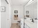Bright bathroom featuring white vanity, light tile floor, and modern decor at 850 Tidewater Shores Loop # 108, Bradenton, FL 34208