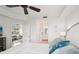 Bright bedroom boasts an ensuite bathroom and a comfortable living space, creating a relaxing retreat at 850 Tidewater Shores Loop # 108, Bradenton, FL 34208