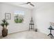 Neutral bedroom features lots of light, tile floor, and modern decor at 850 Tidewater Shores Loop # 108, Bradenton, FL 34208