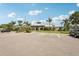 Community clubhouse featuring ample parking and landscaping, perfect for community gatherings and events at 850 Tidewater Shores Loop # 108, Bradenton, FL 34208