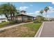Charming clubhouse exterior featuring lush landscaping and elegant architectural design at 850 Tidewater Shores Loop # 108, Bradenton, FL 34208