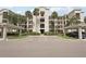 Condo complex with well-manicured landscaping and convenient covered parking areas at 850 Tidewater Shores Loop # 108, Bradenton, FL 34208