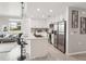 Modern kitchen featuring stainless steel appliances, an island with seating, and stylish countertops at 850 Tidewater Shores Loop # 108, Bradenton, FL 34208