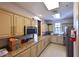 Kitchen featuring granite countertops, stainless steel appliances, and ample cabinet space at 850 Tidewater Shores Loop # 108, Bradenton, FL 34208