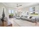 Bright living room offering comfortable seating, elegant decor, and serene outdoor views at 850 Tidewater Shores Loop # 108, Bradenton, FL 34208