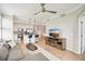 Chic living room blending into a modern kitchen area with bar stools and sleek appliances at 850 Tidewater Shores Loop # 108, Bradenton, FL 34208