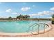 Enjoy the community pool area with ample lounge seating and sunny skies at 850 Tidewater Shores Loop # 108, Bradenton, FL 34208