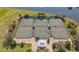 Aerial view of well-maintained tennis courts and surrounding landscape at 850 Tidewater Shores Loop # 108, Bradenton, FL 34208