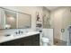 Bright bathroom featuring modern fixtures, a spacious vanity, and a sleek glass-enclosed shower at 8537 Pavia Way, Bradenton, FL 34202