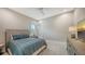 Bedroom featuring comfortable furnishings, a ceiling fan, and a serene atmosphere for relaxation and rest at 8537 Pavia Way, Bradenton, FL 34202
