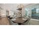 Open floor plan with dining area, kitchen, and living space at 8537 Pavia Way, Bradenton, FL 34202
