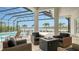 Beautiful pool area with outdoor seating and stunning lake views at 8537 Pavia Way, Bradenton, FL 34202