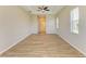 Large bedroom featuring tile flooring, a ceiling fan, and ample natural light at 8772 Stone Harbour Loop, Bradenton, FL 34212