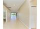 Bright foyer with tiled flooring and views of the living areas and backyard at 8772 Stone Harbour Loop, Bradenton, FL 34212