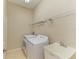 Laundry room with a washing machine and storage at 8772 Stone Harbour Loop, Bradenton, FL 34212