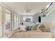 Open-concept living room featuring stylish decor, a large sectional sofa, and plenty of natural light at 8963 Fishermens Bay Dr, Sarasota, FL 34231