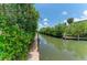 Waterfront view of canal and community at 8963 Fishermens Bay Dr, Sarasota, FL 34231