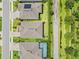 A top-down aerial view of a home with well-kept lawn at 926 Fernleaf Run, Bradenton, FL 34212
