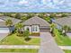 Aerial view of a single Gathering home with an oversized driveway at 926 Fernleaf Run, Bradenton, FL 34212