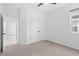 Bedroom features neutral carpet and a double door closet at 926 Fernleaf Run, Bradenton, FL 34212