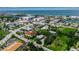 Stunning aerial view of a coastal community, showcasing the waterfront and neighborhood at 105 Shore Rd, Nokomis, FL 34275