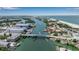 Picturesque aerial view of coastal area, featuring a bridge, boats, and waterfront at 105 Shore Rd, Nokomis, FL 34275