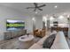 Living room view into the kitchen, featuring a comfortable layout at 105 Shore Rd, Nokomis, FL 34275