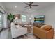 Bright and inviting living room featuring modern furnishings and decor with lots of natural light at 105 Shore Rd, Nokomis, FL 34275